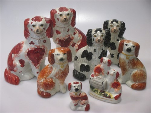 Lot 74 - Three pairs of Victorian Staffordshire pottery...