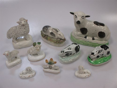 Lot 82 - A group of pottery rabbit, sheep and dog...