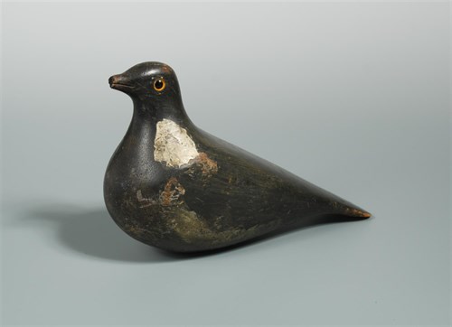 Lot 330 - A 19th century carved and polychrome wood painted pigeon decoy