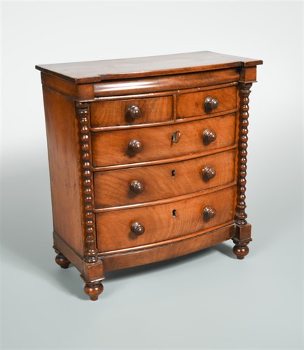 Lot 320 - A 19th century mahogany miniature bowfront chest of drawers