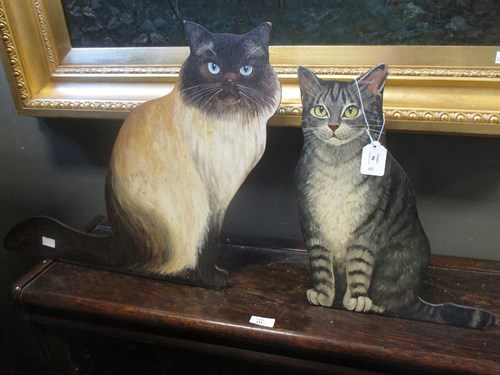 Lot 96 - A group of four hand-painted "cat" dummy...