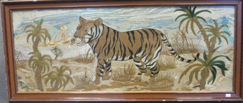 Lot 340 - A wool and silken thread embroidered panel of...