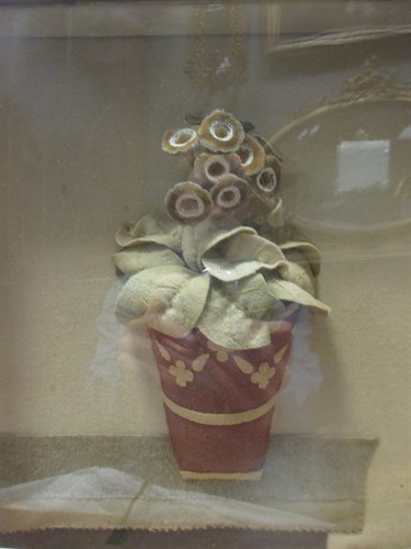 Lot 111 - A George III felt-applique vase of auriculas,...