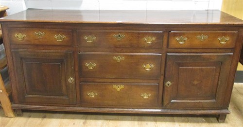 Lot 430 - A George III oak dresser base, with five...