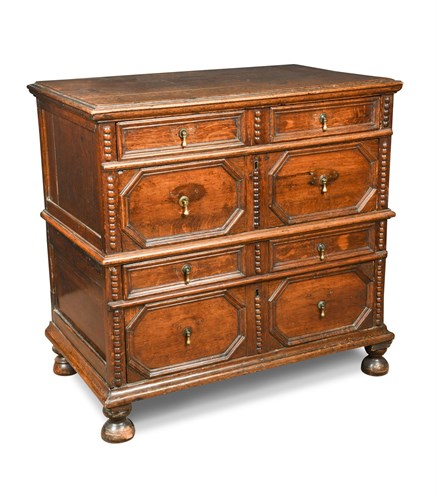 Lot 395 - A 17th century oak chest of drawers