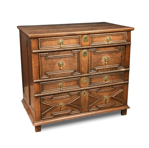 Lot 390 - A 17th century oak chest of drawers