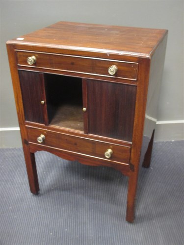 Lot 398 - A 19th century mahogany tambour-door bedside...