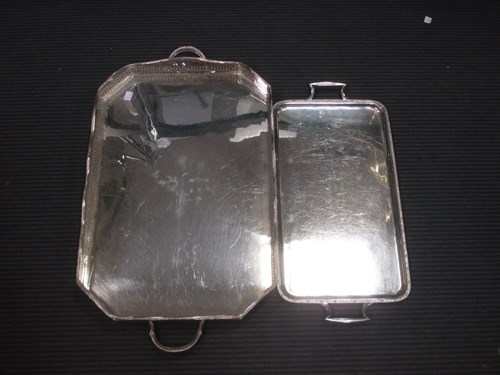 Lot 243 - Two rectangular silver-plated trays, 20th century