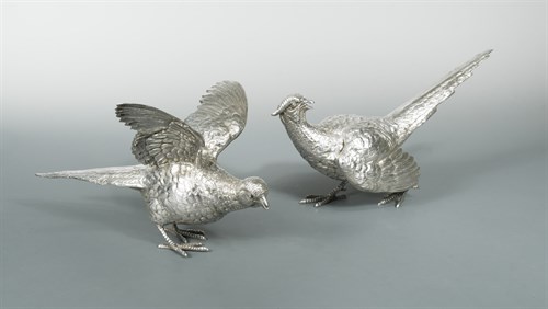 Lot 136 - A pair of 20th century cast silver fighting cock pheasants