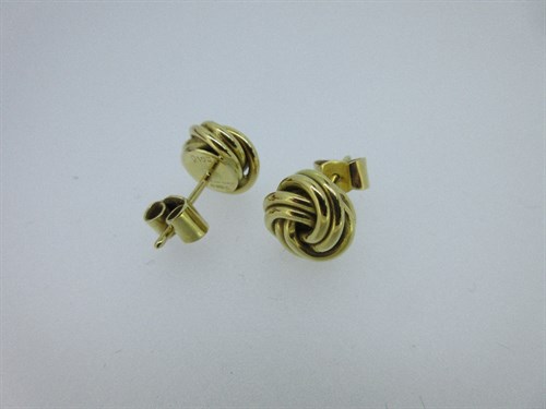 Lot 397 - Cartier - A pair of 18ct gold knot earrings in the original case