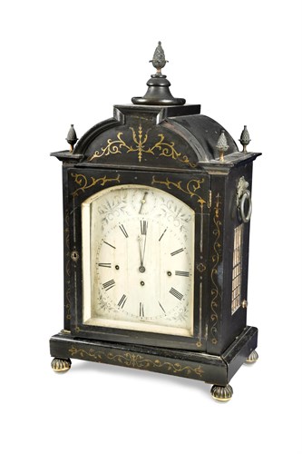 Lot 369 - A Regency ebonised chiming table clock