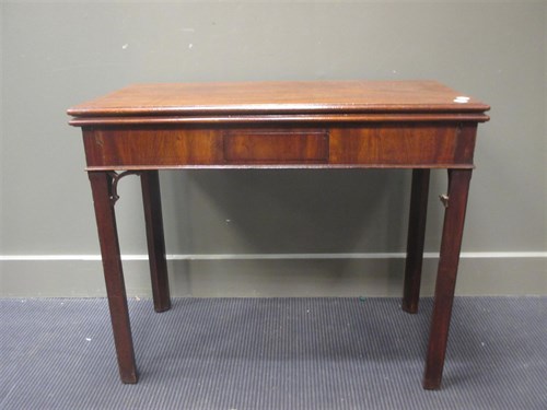 Lot 493 - A George III mahogany tea table with small...