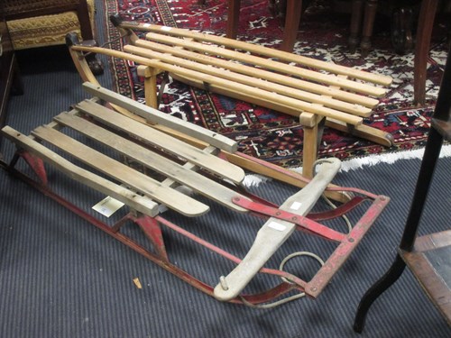 Lot 553 - Two vintage wooden sledges