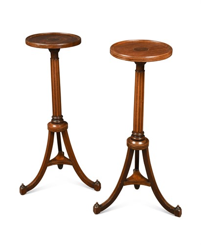 Lot 457 - A pair of late Victorian mahogany torchere stands
