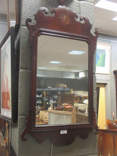 Lot 319 - An 18th century mahogany fret framed wall...