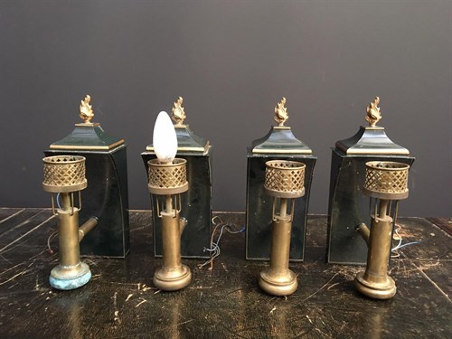 Lot 293 - A set of four Regency style toleware and brass mounted wall lights