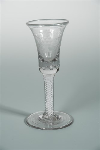 Lot 46 - A George III cordial glass, the faceted bowl...
