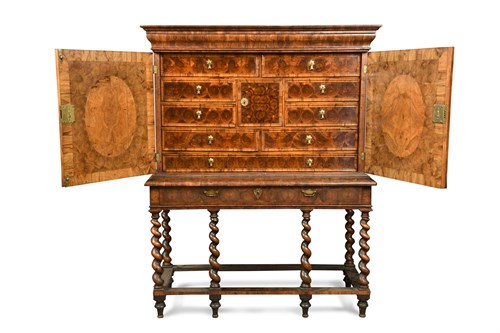 Lot 384 - A late 17th century laburnum oyster veneer cabinet on stand