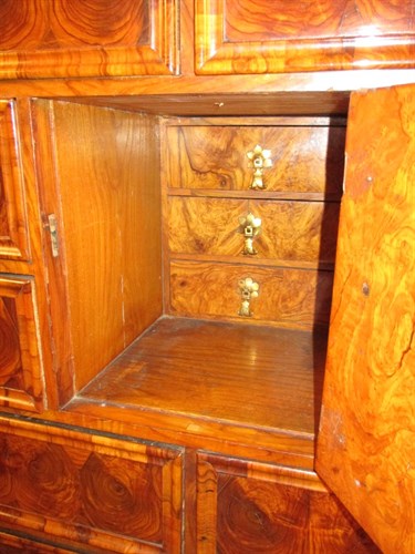 Lot 384 - A late 17th century laburnum oyster veneer cabinet on stand