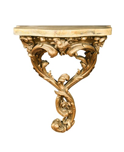 Lot 430 - A 19th century carved giltwood serpentine console