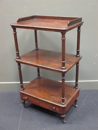 Lot 361 - A Victorian figured walnut whatnot of three...