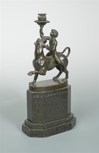 Lot 304 - A late 19th or early 20th century Continental bronze and polished marble candlestick, possibly German