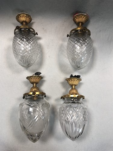 Lot 297 - A pair of Regency style 'pineapple' gilt mounted cut glass ceiling lights