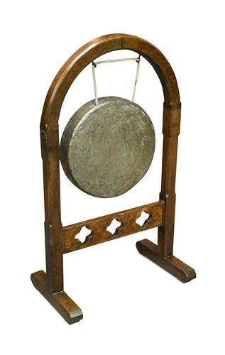 Lot 444 - A Victorian brass gong on a Gothic oak stand