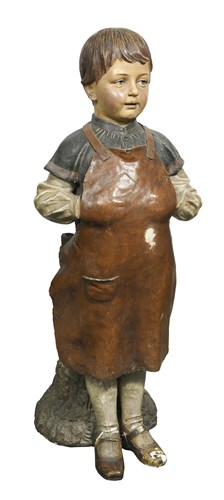 Lot 338 - A late 19th century Austrian painted terracotta figure of a boy cobbler, possibly Goldscheider