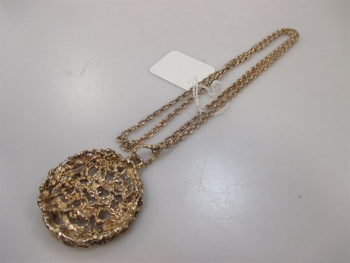 Lot 166 - A 9ct gold rough nugget circular pendant and...