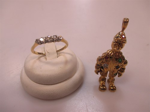 Lot 162 - A 9ct gold gem set clown pendant 6g and a 5...