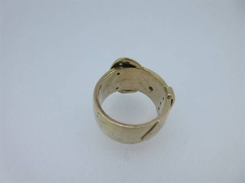 Lot 266 - A large diamond set buckle ring
