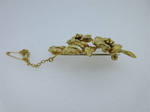 Lot 210 - An 18ct gold flower spray brooch by Cropp & Farr