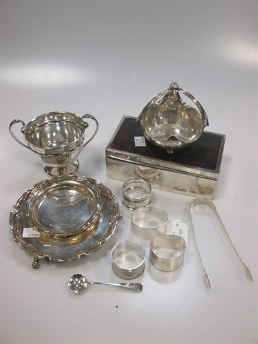 Lot 205 - Four silver napkin rings, two silver waiters,...