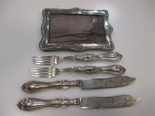 Lot 222 - A silver photograph frame and two pairs of...