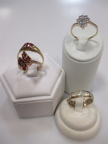 Lot 184 - A 9ct gold full eternity ring, a 9ct gold...