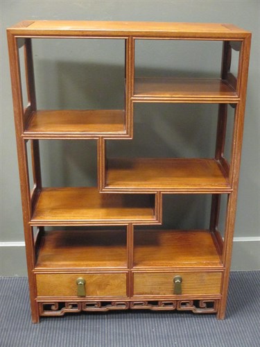 Lot 476 - A 20th century oriental hardwood bookcase with...