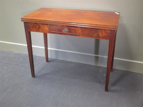 Lot 484 - A Hepplwhite mahogany tea table with spoon...