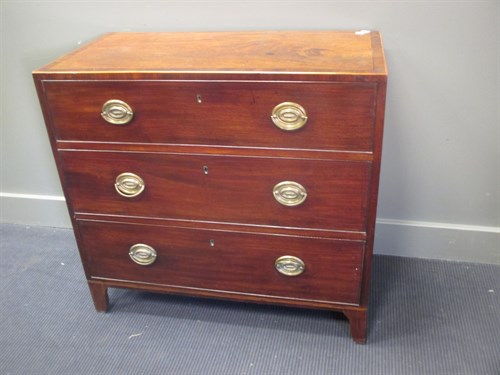 Lot 479 - A George IV mahogany chest of three long...