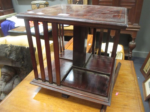 Lot 462 - An Edwardian mahogany table top revolving...