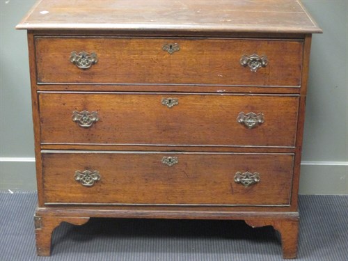 Lot 474 - A 19th century oak chest of three graduated...