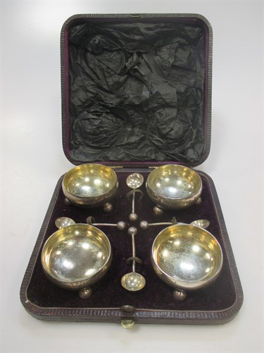 Lot 219 - A cased set of four Victorian silver cauldron...
