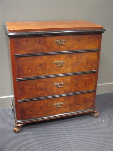 Lot 520 - A continental figured walnut chest of four...