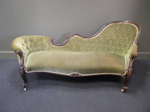 Lot 390 - A Mid-Victorian walnut chaise longue with...