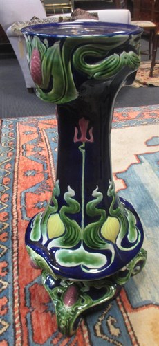 Lot 92 - A Majolica jardiniere stand, 71cm high