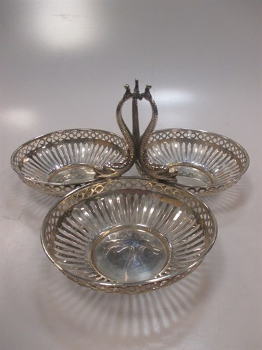 Lot 228 - A silver bon bon dish with dolphin handles