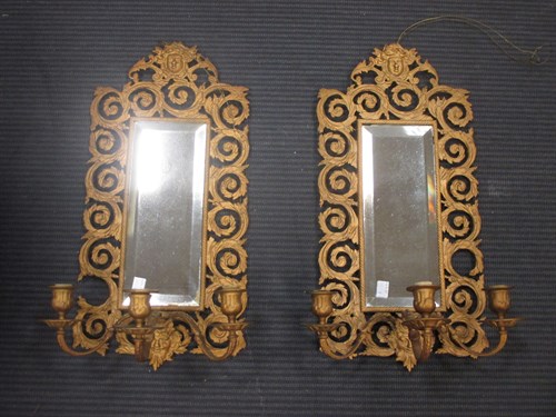 Lot 438 - A pair of pierced gilt metal three branch...