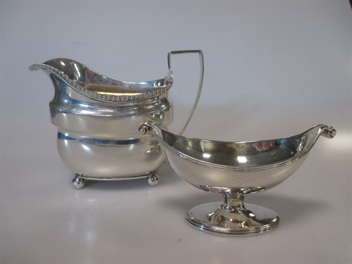 Lot 209 - A Georgian silver cream jug, a Georgian silver...
