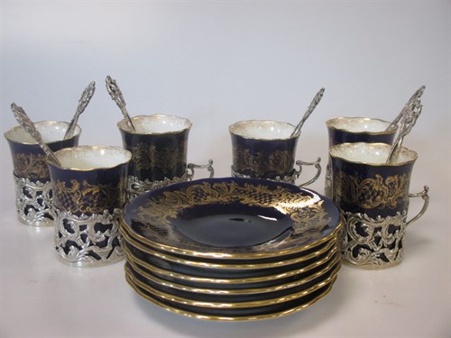 Lot 211 - A set of six Coalport cups and saucers, the...