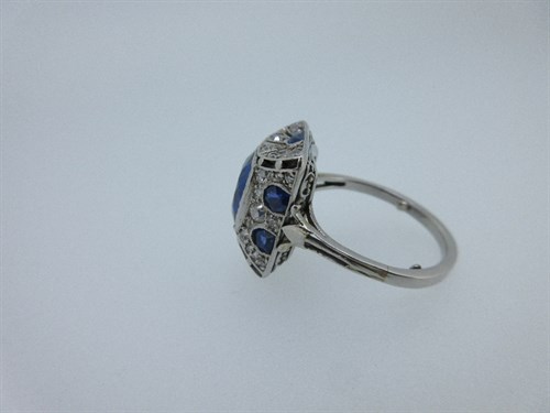 Lot 411 - An Art Deco sapphire and diamond ring